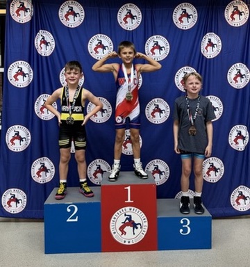 Podium finishers at a WWC tournament