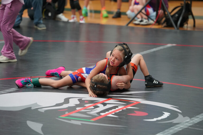A wrestler working for control during a match